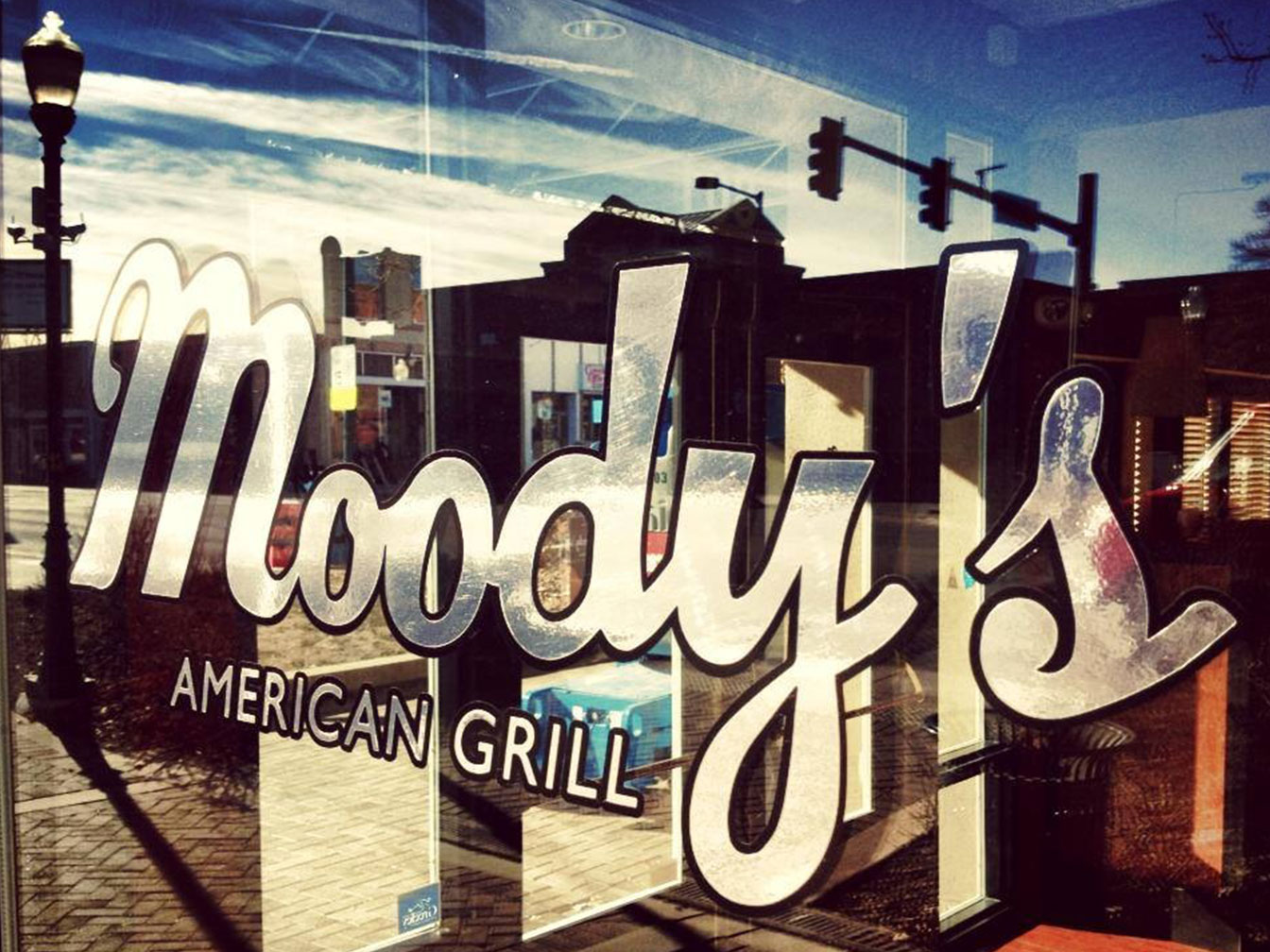 Moody's American Grill Restaurant Logo